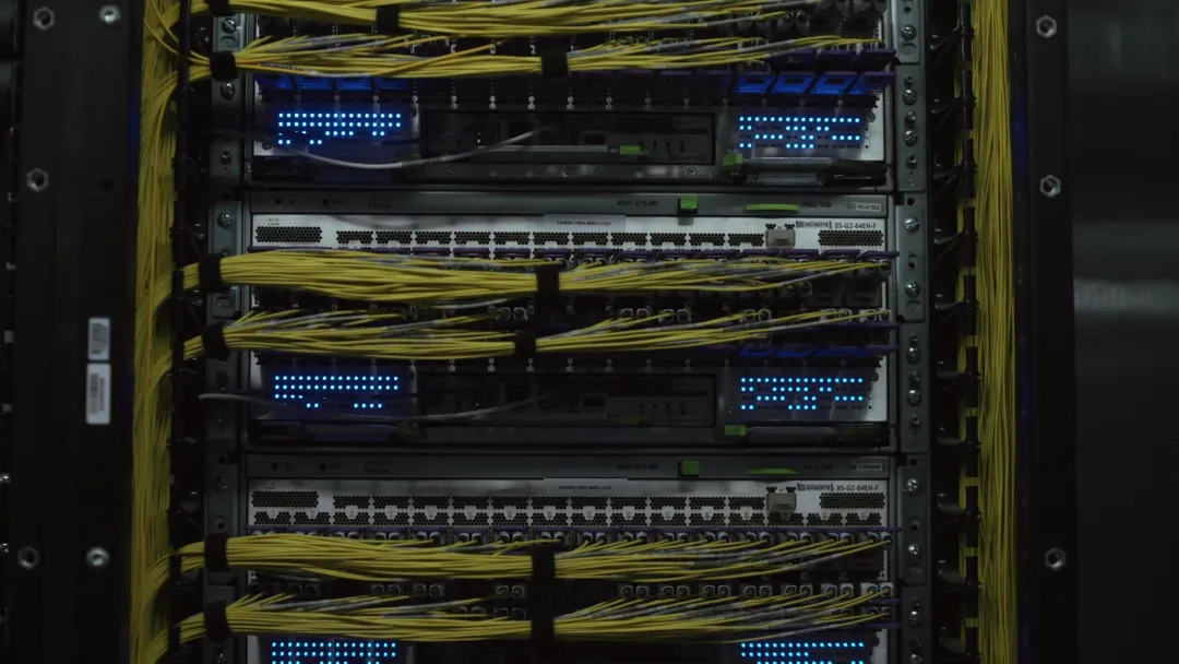 Ethernet fabric switches in a Meta Prometheus network rack with fiber bundles to each port
